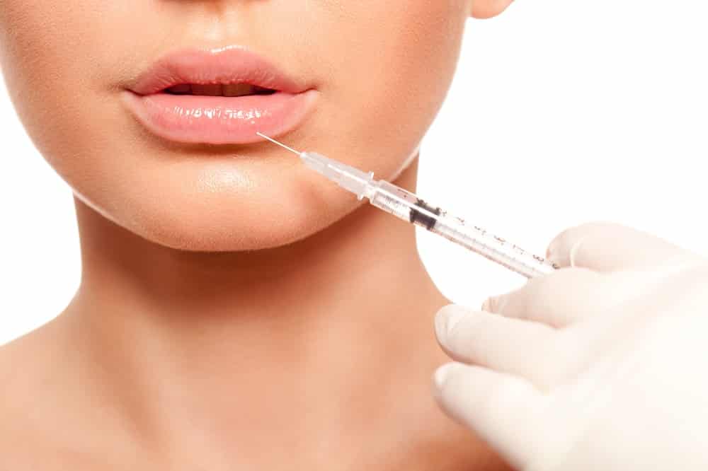 Women getting injection to Lip | Get Dermal Fillers at Euro Look Medical Spa in Solon, Ohio