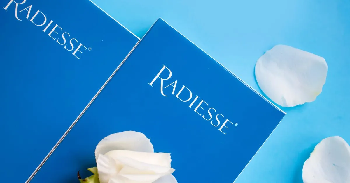 Woman with defined jawline and firm skin, symbolizing collagen biostimulation results from traditional Radiesse or hyperdilute Radiesse